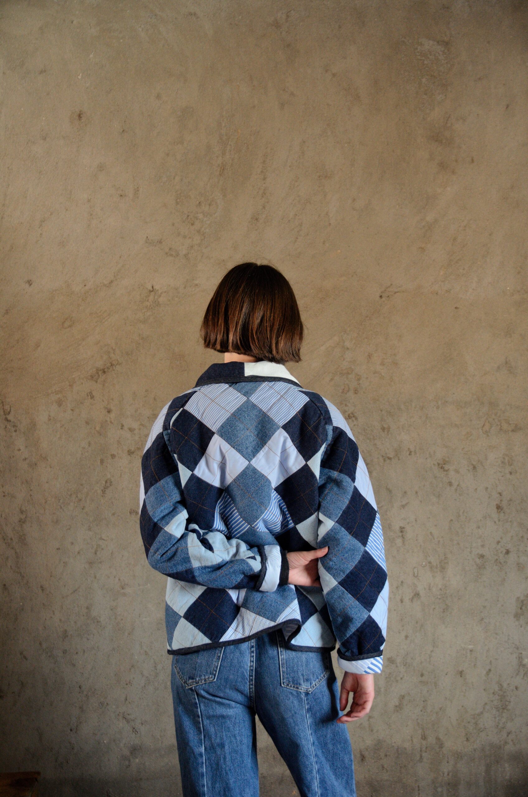 Antsa coat in blue quilted denim back view