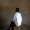 Back view of Cleo white shirt with double crochet collar