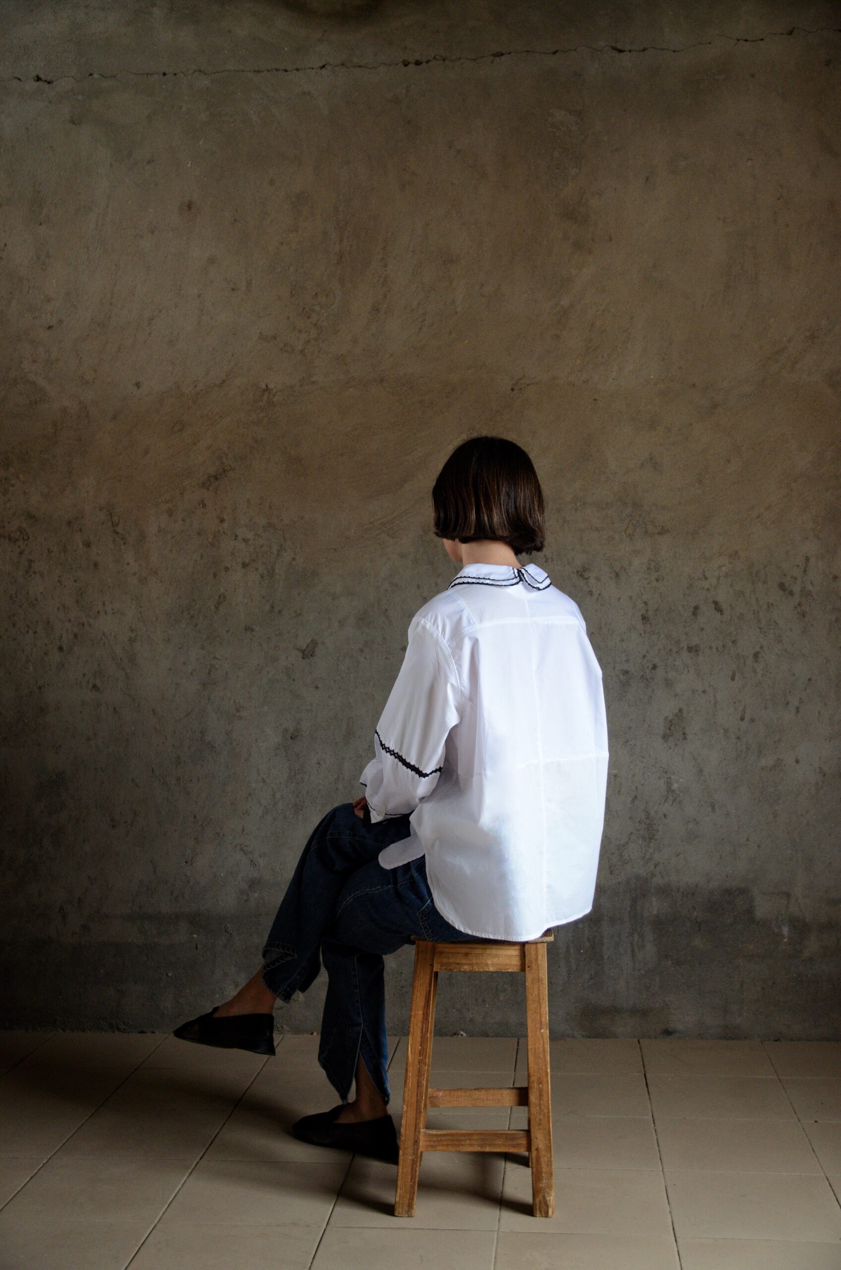 Back view of Cleo white shirt with double crochet collar
