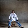 Cleo white shirt with double crochet collar worn seated