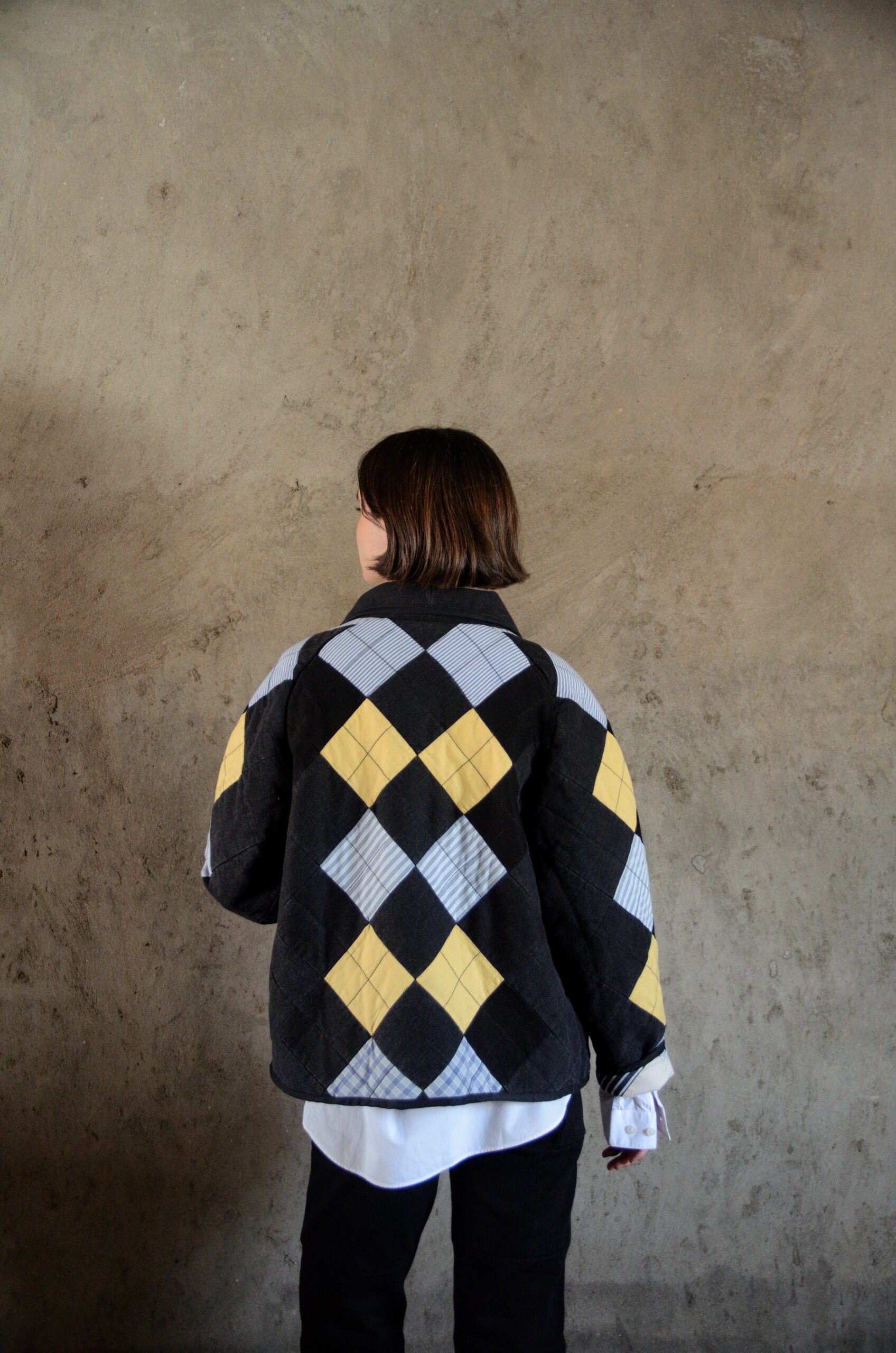 Manteau Antsa noir en coton et denim matelassés vue dos