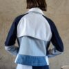 Doria jacket in blue patchwork denim back view with trench-inspired yoke